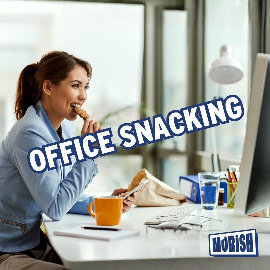 Women snacking at office desk | Morish Snacks