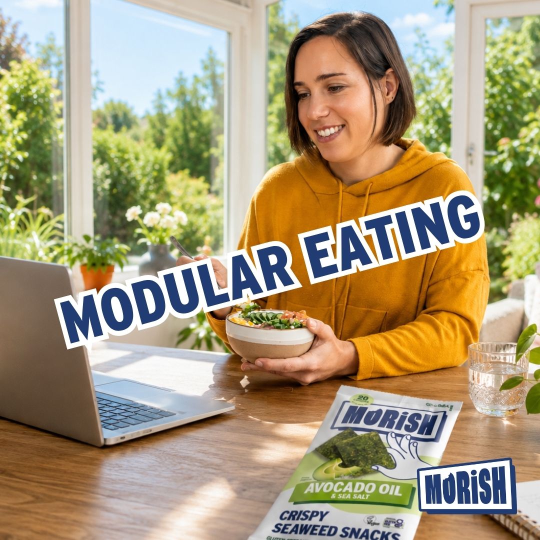 Woman eating in front of laptop with snack pack | Morish Snacks