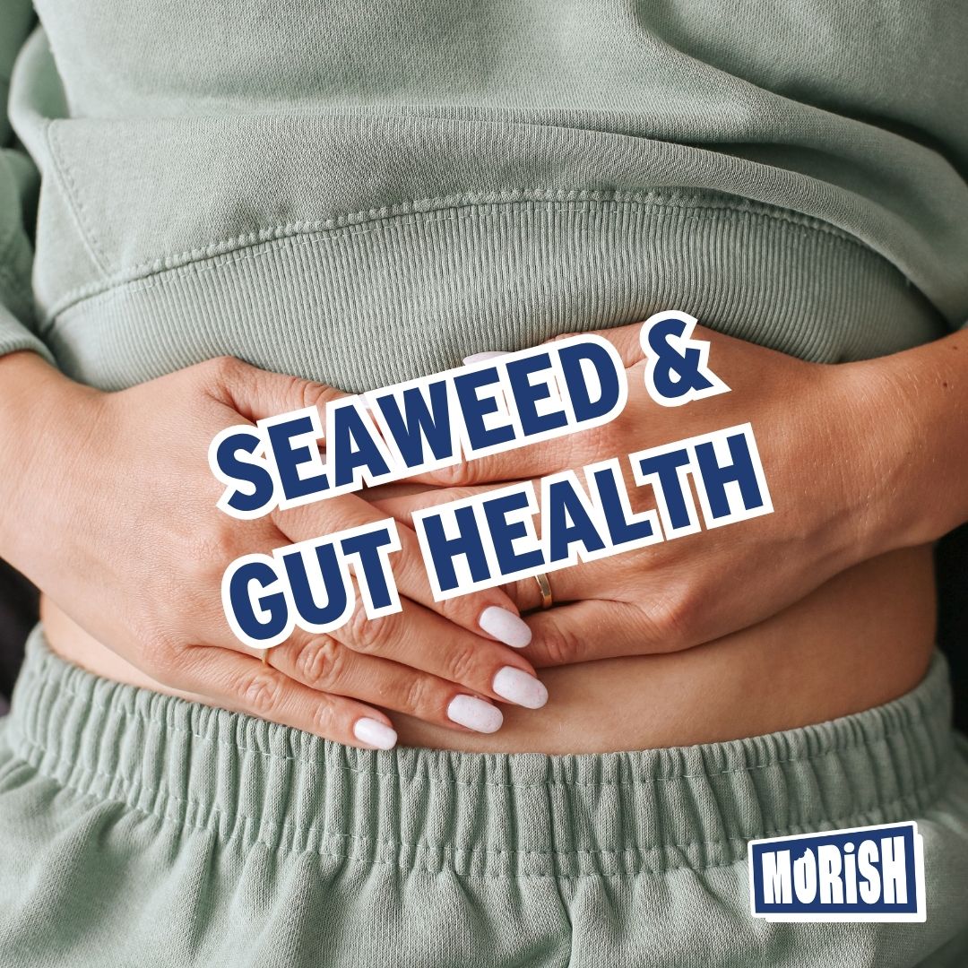 Woman holding stomach with hands | Morish Snacks