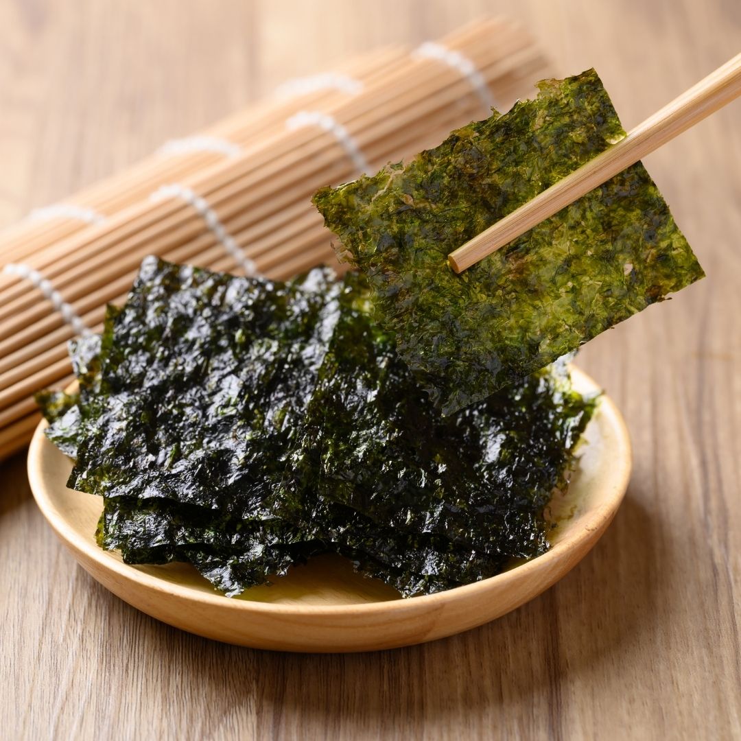 Crispy seaweed picked up with chopsticks | Morish Snacks