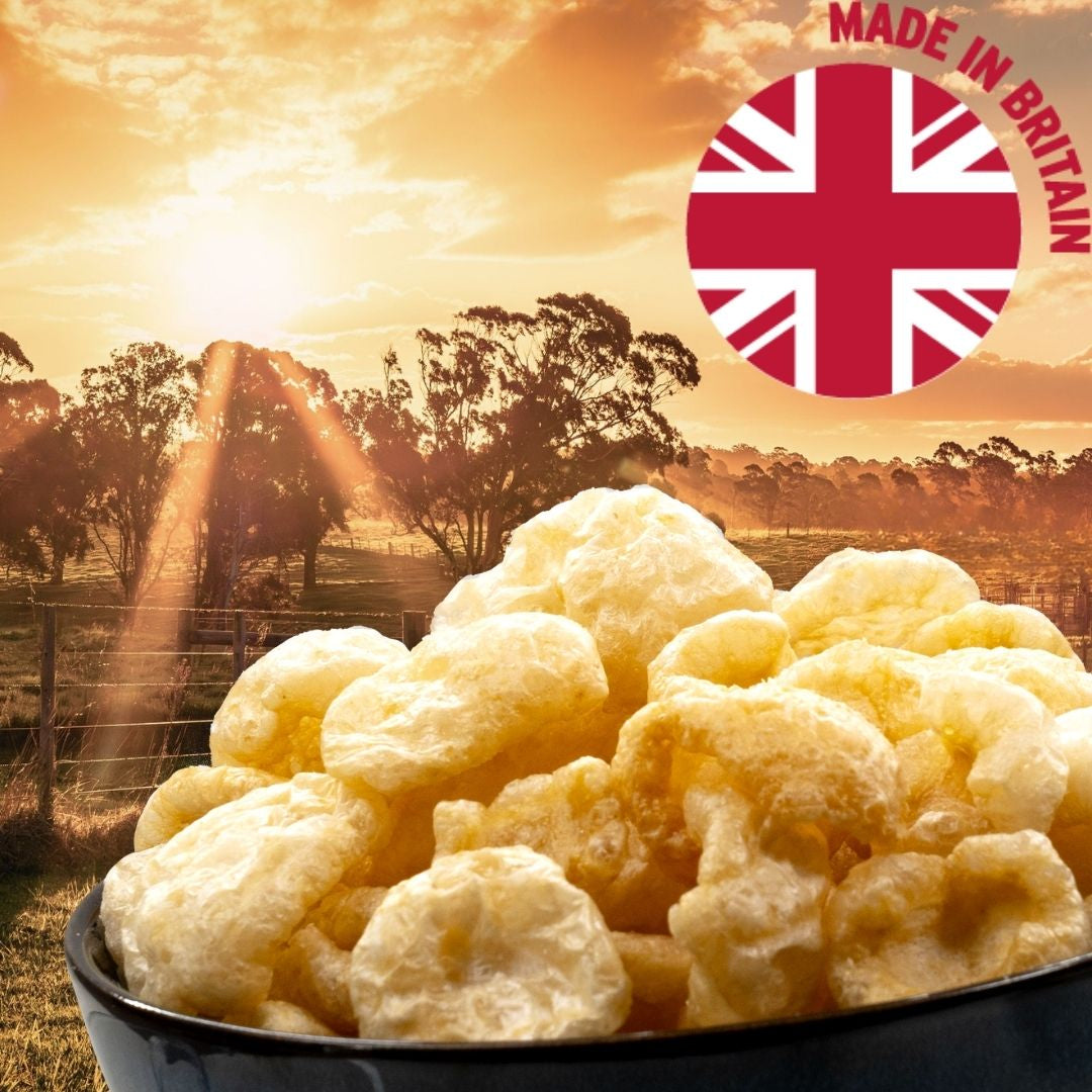 Bowl with pork snacks in front of British farm land | Morish Snacks