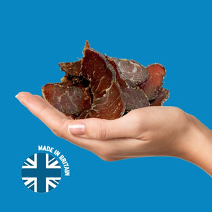Hand holding air-dried steak original | Morish Snacks