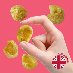 Hand holding pork chicharrónes sea salt | Morish Snacks