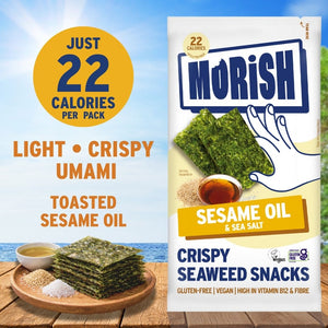 Plate and pack with crispy sesame oil seaweed in front of ocean | Morish Snacks