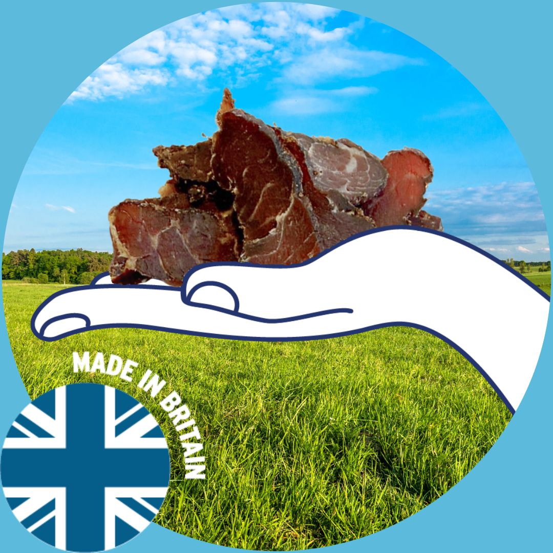 Illustrative hand with beef bites and British meadow | Morish Snacks